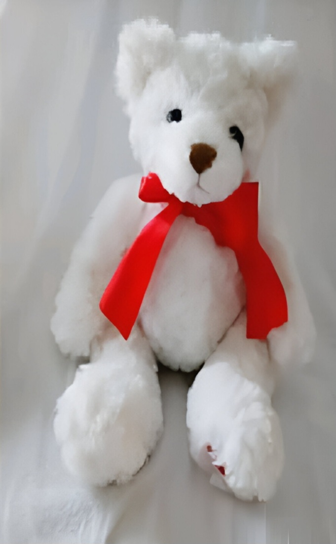 oso blanco con lazo rojo